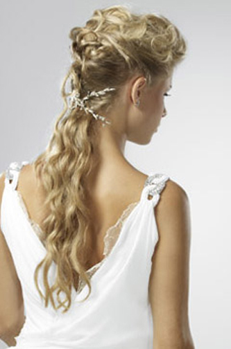 A gorgeous feminine wedding hairstyle with a Greek goddess feel to it.