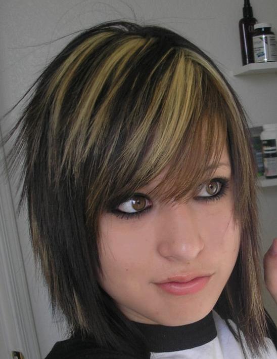 Great emo haircut with blonde streaks in dark brown hair