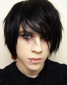 Classic emo haircut with dyed black hair and side fringe covering an eye