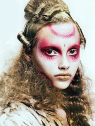 Add some lovely pink make-up around your eyes and forehead for this somewhat disjointed Victorian era look