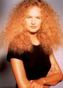 Curly hair that is not cut into layers can create a mushroom effect with the hair flairing up on the sides of the face.
