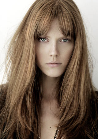 Blunt bangs can look great on long face shapes as it helps shorten the 