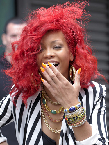 red hair with blonde peekaboos. rihanna-red-hair-.