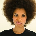 Woman with Afro Making Face Woman with Afro Making Face