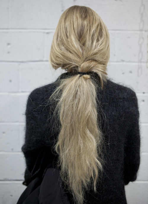 long blonde hair in a low ponytail