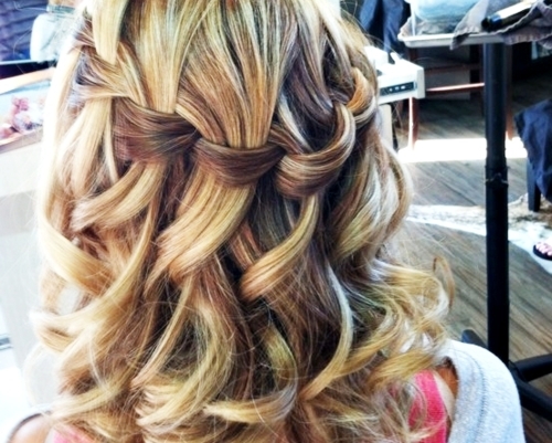 pretty blonde curly hair with waterfall braid