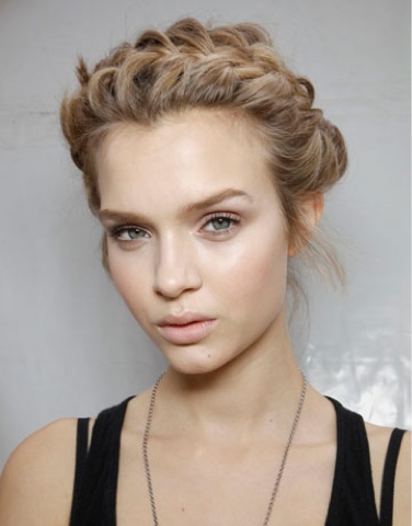 Lovely light blonde hair in a braided bun hairstyle