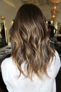 Subtle balayage technique on natural brown hair