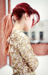 Red and blonde hair in a ponytail