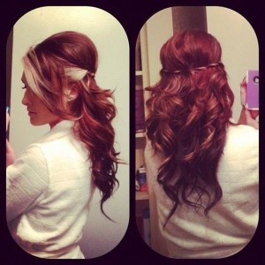 Beautiful rich curled air with platinum strands going through the bangs